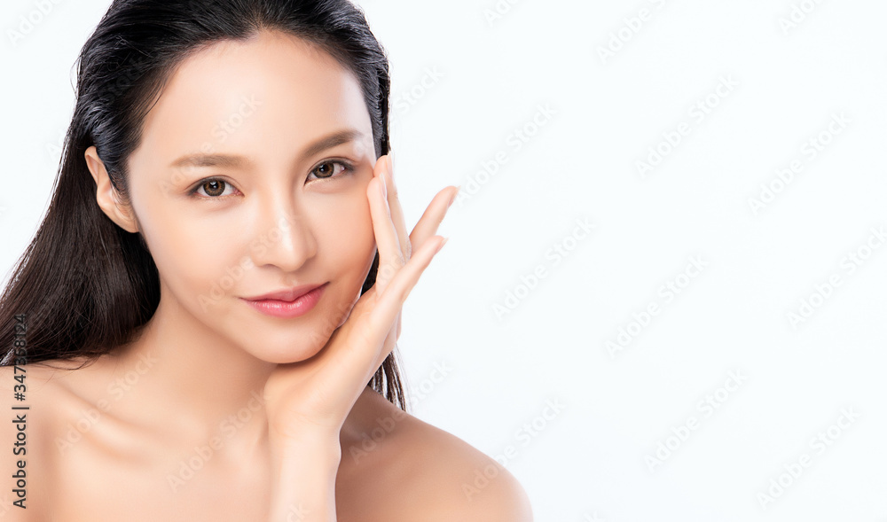 Fototapeta premium Beautiful Young Asian Woman with Clean Fresh Skin. Face care, Facial treatment, Cosmetology, beauty and healthy skin and cosmetic concept, woman beauty skin isolated on white background