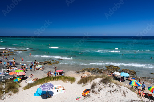 Fototapeta Naklejka Na Ścianę i Meble -  A populated beach in Salento, Puglia