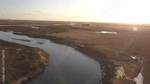 4K aerial footage of amazing waterfall known as Aegissufoss (Ægissíðufoss) Waterfall located in Hella, Iceland.