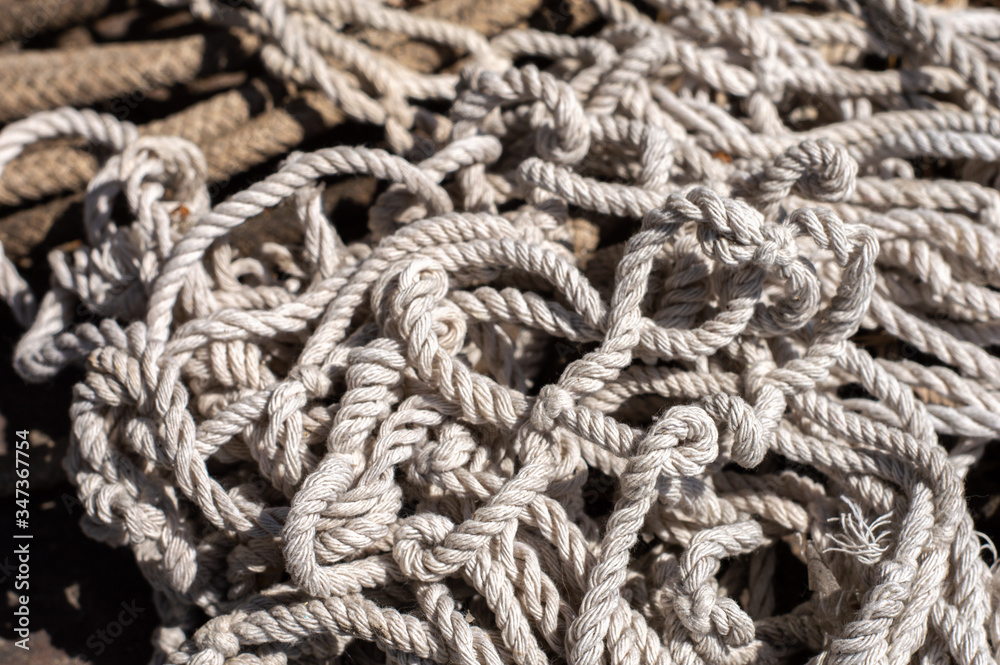 Texture of old and thin rope close up