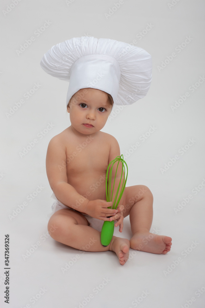 Little baby cook on an isolated background
Little baby cook on an isolated background