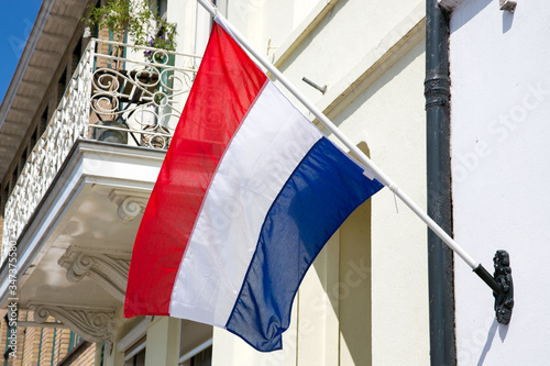 Flag of the Kingdom of the Netherlands in red, white and blue.