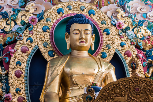 Gold gilded Buddha statue in Uttarakhand,India
