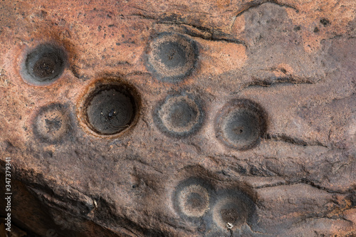 Aboriginal grinding hollows, historically used for food preparation, Kakadu National Park, Northern Territory, Australia