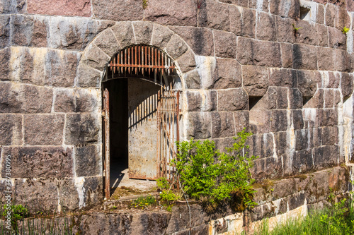 Iron gate in a fortified wall