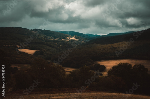 valley with hills and forests