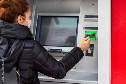 withdrawing money from a cash machine
