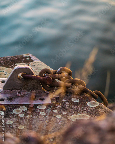 rusty chain near the water