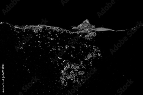 Water surface black background © Tsiumpa