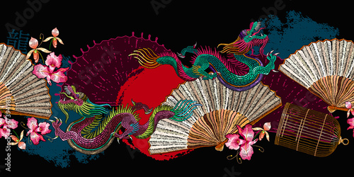 Asian dragons, rising sun, japan fan, sakura flowers and golden cage. Ethnic horizontal seamless pattern. Fashion japanese and chinese style. Template for clothes. Oriental art