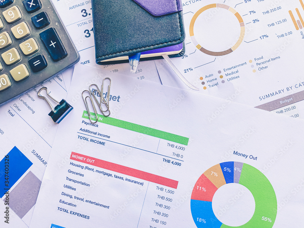 Fototapeta premium analytics graph and pie chart on many paperwork and statistical. business workplace and finance concept.