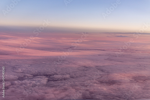 Soft flat purple clouds from plane window