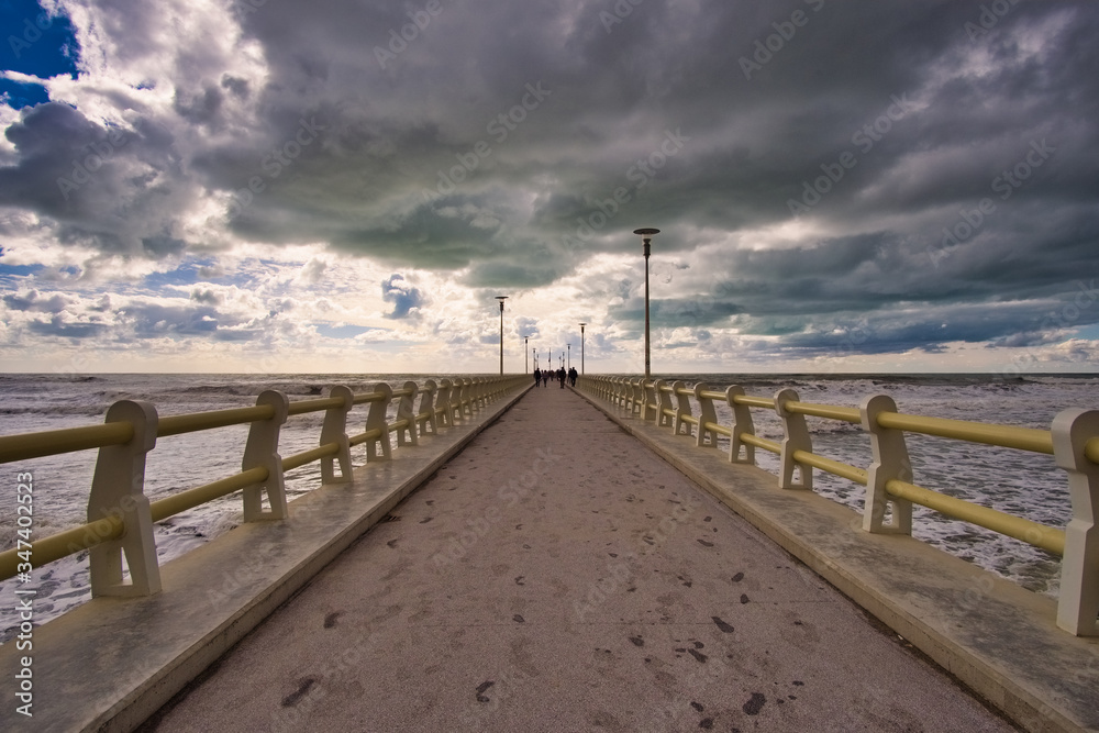 Pier of Forte dei Marmi on a day of clouds and rain Tuscany Italy