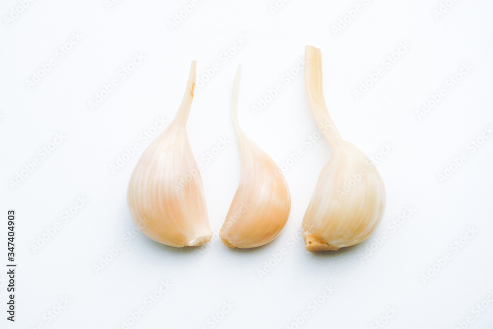 Fototapeta premium Sugar garlic on the white table.