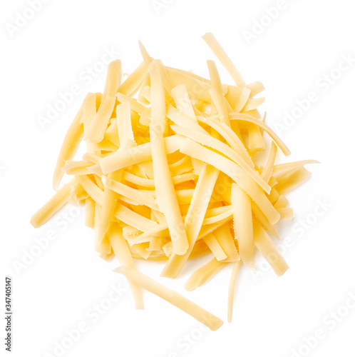 Grated cheese isolated on white background. Slices cheese. Top view. photo