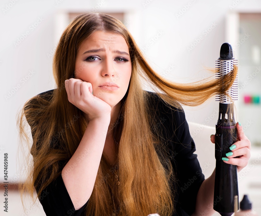 Fototapeta premium Young woman having a bad hair day