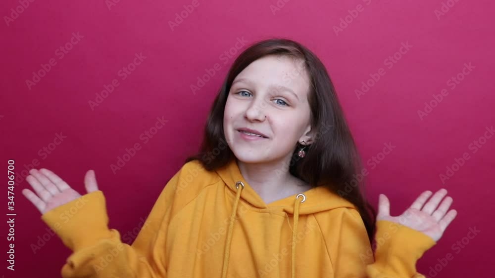 Happy, young. beautiful girl in the orange bike POPs into the palm of your hand. His bright blue eyes. Happy, young. beautiful girl in the orange bike POPs into the palm of your hand. His bright blue eyes.