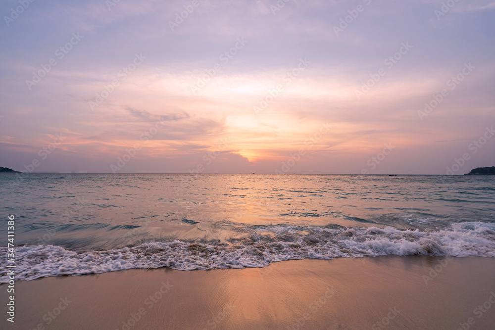 Landscape of beautiful sunset over the sea at tropical beach in summer