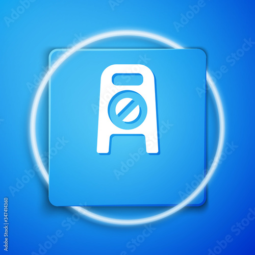 White Wet floor and cleaning in progress icon isolated on blue background. Cleaning service concept. Blue square button. Vector Illustration