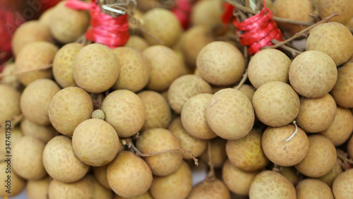 Longan fruit on the counter in the market.