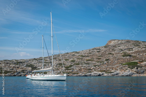 Anchorage of a sailing boat near a small island in the Aegean Sea
