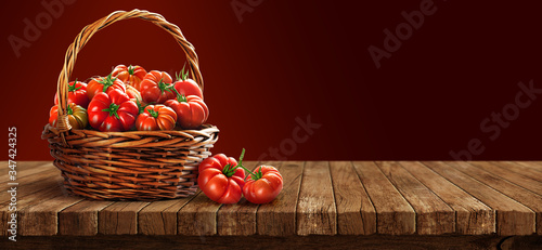 Freshly tomatoes in a basket on a wooden table