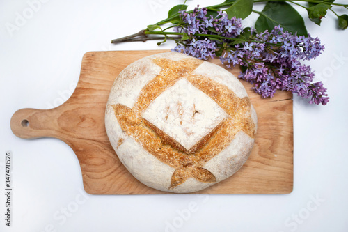 Traditional bread on wooden table.
