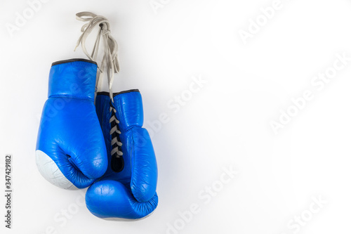 Blue boxing gloves on a white background.