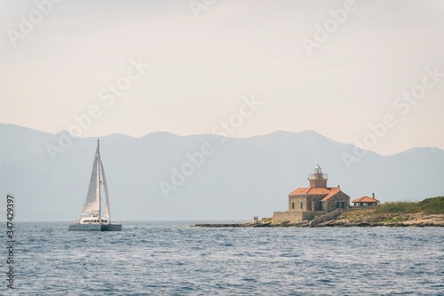 Fototapeta Naklejka Na Ścianę i Meble -  Sailing on adriatic sea Korcula Makarska Korcula Croatia. Yacht in marina, sailing in Croatia.
