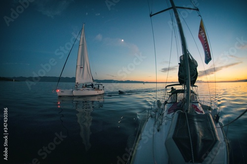 Sailing sunset on adriatic sea Makarska Korcula Croatia. Yacht in marina, sailing in Croatia. 