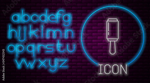 Glowing neon line Adhesive roller for cleaning clothes icon isolated on brick wall background. Getting rid of debris, dust, hair, fluff, pet wool. Neon light alphabet. Vector Illustration