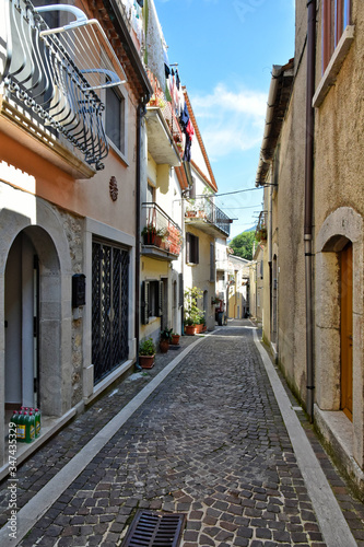 A narrow street between the old houses of the village of Pietraroja, in the province of Benevento, Italy © Giambattista
