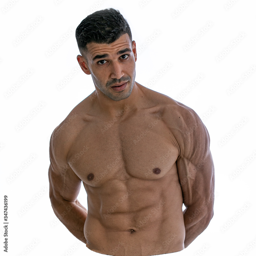 Fototapeta premium Fit young man with beautiful torso, isolated on white background