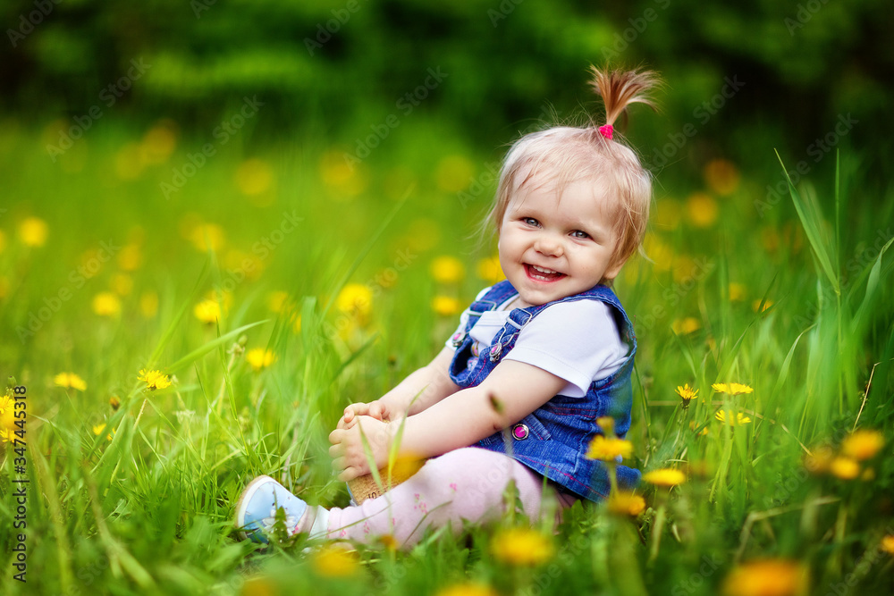 girl child walks in the garden in spring, cherry blossoms, blooming, may girl child walks in the garden in spring, cherry blossoms, blooming, may