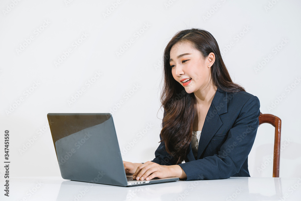 young asian woman finding job at office home.Beautiful young woman using a laptop computer. Portrait of asian young asian woman finding job at office home.Beautiful young woman using a laptop computer. Portrait of asian