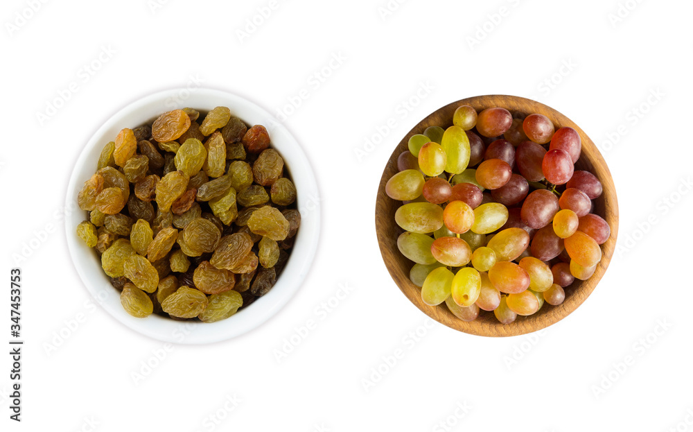 Grapes and raisins Kishmish isolated on white background. Top view. Grapes and dried fruit in a wooden bowl isolated on white background. Top view. Green grapes Kishmish with copy space for text. Grapes and raisins Kishmish isolated on white background. Top view. Grapes and dried fruit in a wooden bowl isolated on white background. Top view. Green grapes Kishmish with copy space for text.