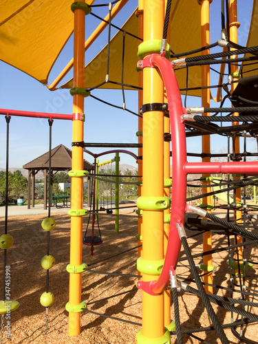 New modern Playground equipment shade and ropes at park school