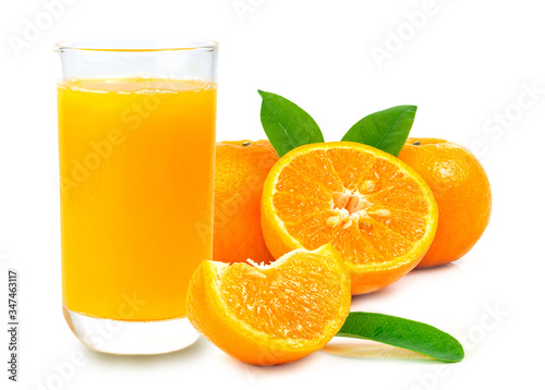 Orange juice and fruits on a white background