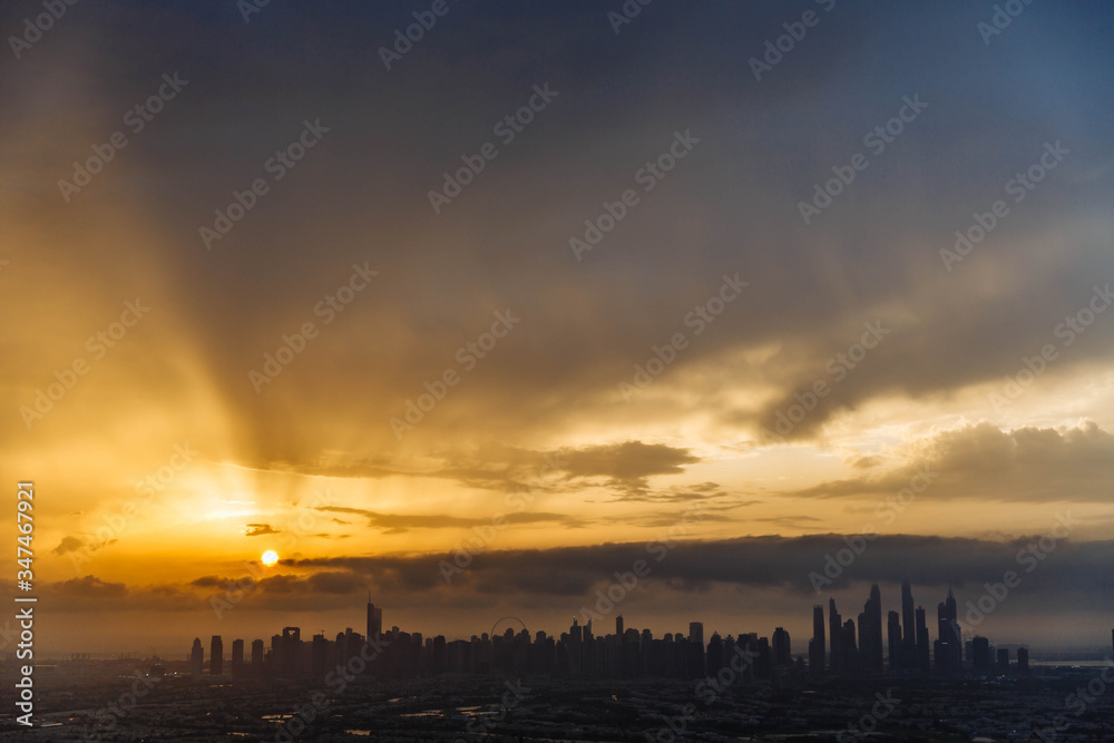 The beauty panorama of skyscrapers in Dubai Marina. UAE. Sunset over Dubai, aerial skyline. The beauty panorama of skyscrapers in Dubai Marina. UAE. Sunset over Dubai, aerial skyline.