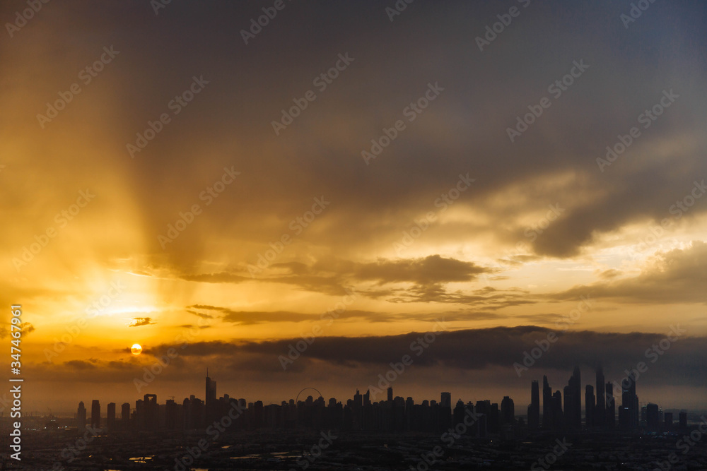 The beauty panorama of skyscrapers in Dubai Marina. UAE. Sunset over Dubai, aerial skyline. The beauty panorama of skyscrapers in Dubai Marina. UAE. Sunset over Dubai, aerial skyline.