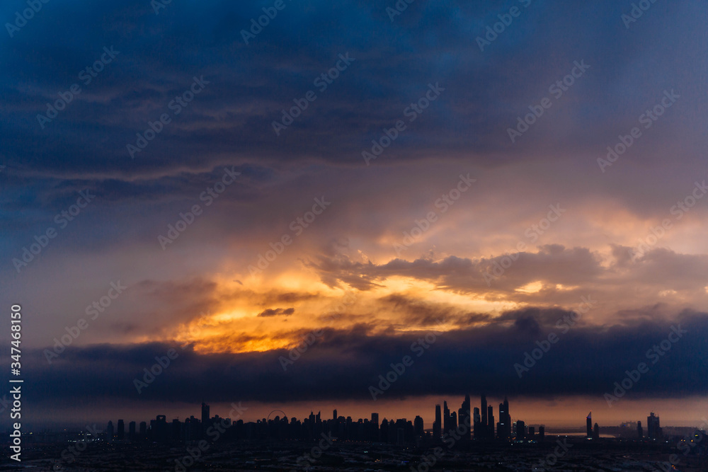 Fototapeta premium The beauty panorama of skyscrapers in Dubai Marina. UAE. Sunset over Dubai, aerial skyline.