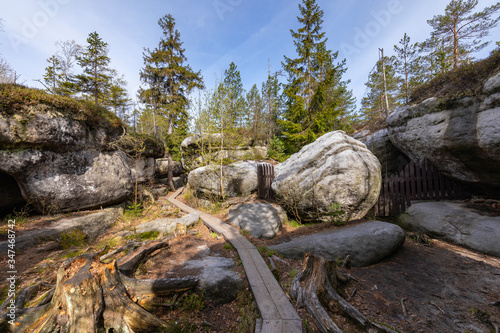 Stolowe Mountains National Park. Wooden boardwalk in Rock Labyrinth hiking trail Bledne Skaly near Kudowa-Zdroj, Lower Silesia, Poland. photo