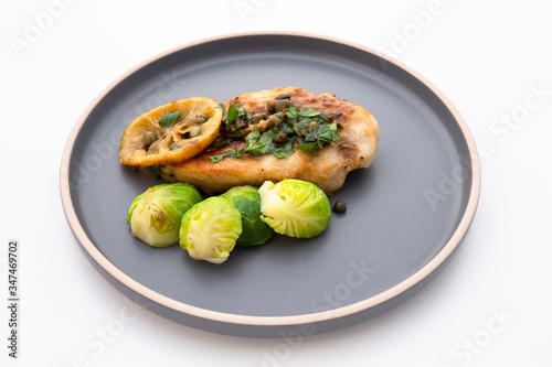 Greek lemon chicken and brussels sprouts with parsley