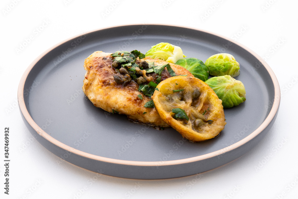 Greek lemon chicken and brussels sprouts with parsley