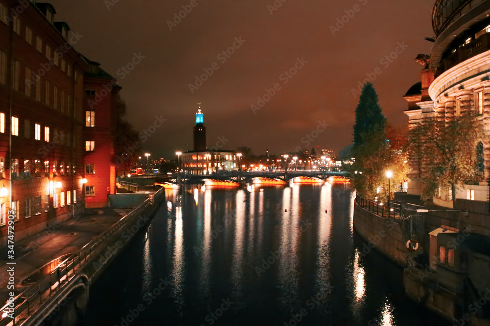 Night view of the city channel and Stockholm City Hall, Sweden