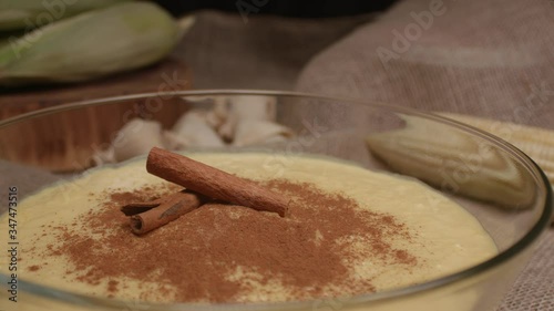 Traditional Brazilian sweet called Curau. Made with corn photo
