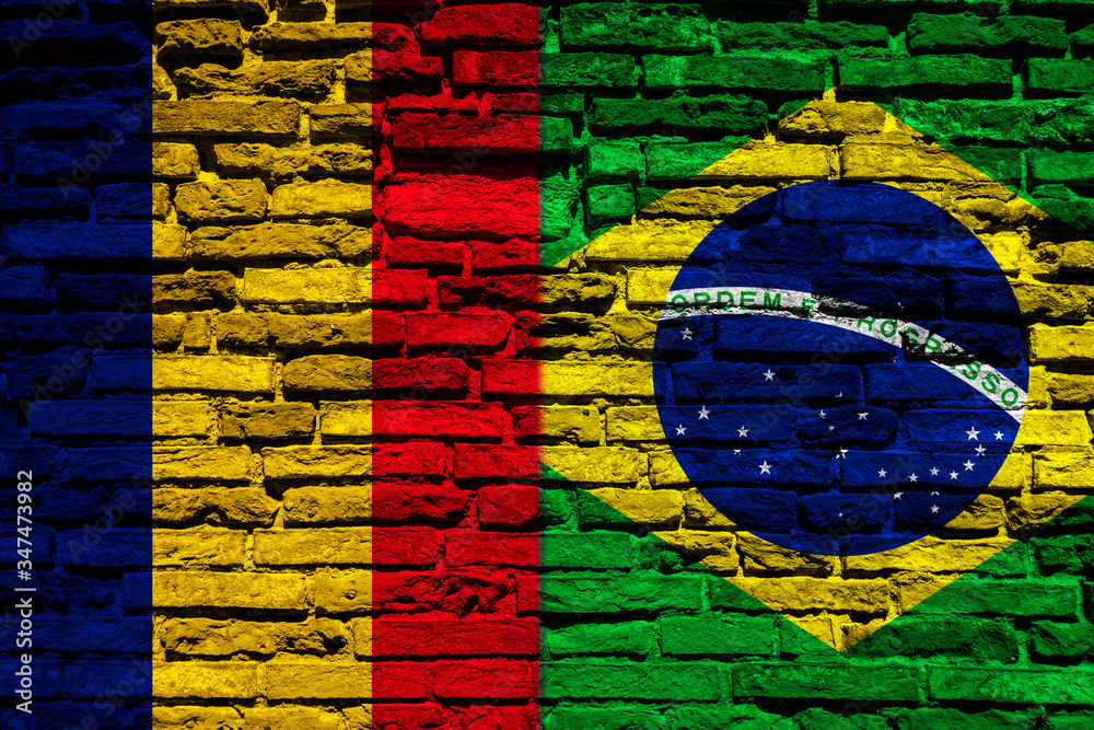 Flag of Chad and Brazil on brick wall