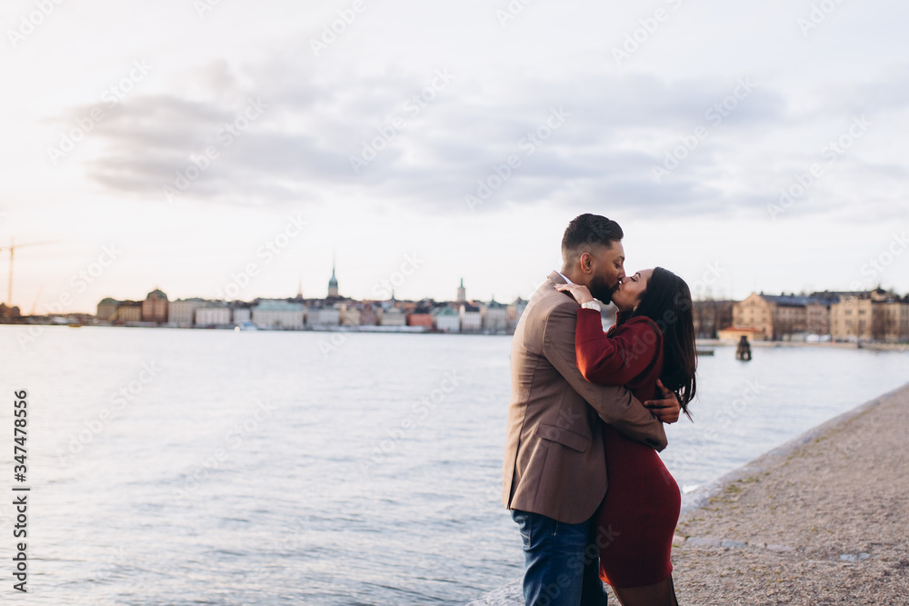 Couple in love together romantic date proposal of wedding outdoors on promenade