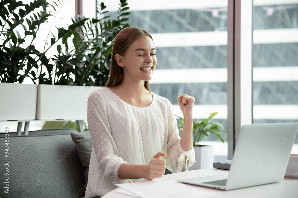 Female office worker got great news feels overjoyed. Businesswoman clenched fist make Yes gesture receive fantastic business opportunity. Successful employee, sales increase career advancement concept Female office worker got great news feels overjoyed. Businesswoman clenched fist make Yes gesture receive fantastic business opportunity. Successful employee, sales increase career advancement concept
