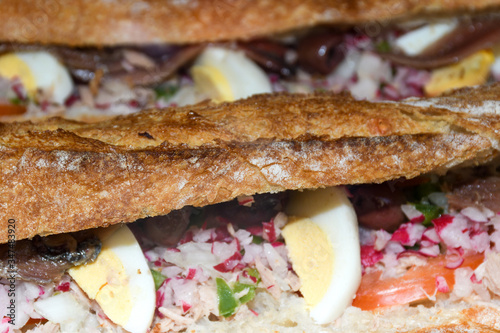 Tuna nicoise sandwich, also known as pan bagnat. The pan bagnat is a sandwich